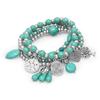 Set of 4 Silver Tone Multi-Charm Fashion Stretch Bracelets w/ Reconstituted Turquoise