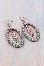 Bead and Dangling Feather Oval Hoop Earrings